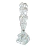 A crystal figurine of two lovers, depicting a nude male and female entwined, signed to base, 11 by