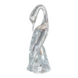 A Daum crystal figurine of a swan, signed 'Daum France' to base, 11 by 10 by 34.5cm high.