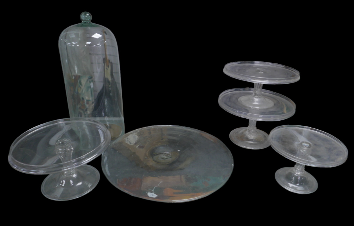 A collection of early 20th century glass cylindrical dome and glass tazzas