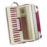 A Scandalli cased piano accordion, with original fitted case.