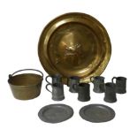 A collection of pewter and brass, including assorted pewter tankards, a large brass charger with