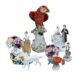 A large Meissen Macaw with crossed swords and impressed markings to its base, a/f, 42.5cm high,