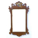 A Victorian mahogany fretwork wall mirror, with gilt carved Ho Ho bird surmount above a