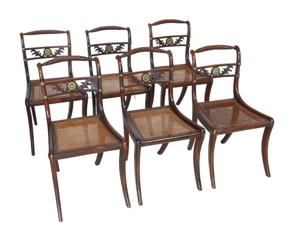 A set of six Regency style mahogany dining chairs, early to mid 20th century, with spiral rope twist