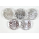 A group of five silver South African Krugerrands, each inscribed 'Fynsilwer 1oz Fine Silver R1',