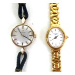 A 9ct gold cased lady's Omega wristwatch, with seventeen jewel movement, champagne dial with