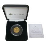 A Jubilee Mint 9ct gold proof Brexit quarter ounce commemorative coin, with plastic capsule,