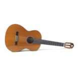 An Alhambra 4P Classical Spanish six string guitar, with rosewood back and sides, solid cedar top,