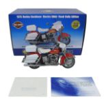 A Franklin Mint 1/10 scale die-cast model of 1976 Harley-Davidson, with original box.