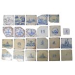 A collection of twenty-three 19th Century onwards delftware tiles, including examples depicting