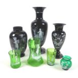 A group of Mary Gregory style vases and glassware, comprising three black glass vases, tallest 33.