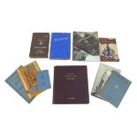 A WWII pilot's log book, together with other military related ephemera/books. (1 bag)