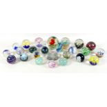 A collection of modern glass paperweights, including Mdina, Malta - Phoenician, and one signed '