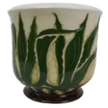 A Moorcroft pottery pineapple leaves pattern jardiniere, with impressed factory marks to its base,