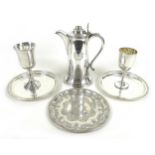 A collection of silver plated wares, including a large Holy Communion wine flagon, engraved with '