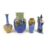 A collection of Royal Doulton vases, comprising a large vase with Art Nouveau floral decoration,