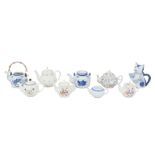 A group of nine 20th century British and Oriental teapots, including two Japanese blue and white
