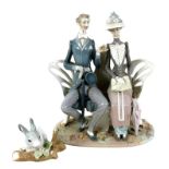 A Lladro figural group, modelled as ' Lovers On A Bench In The Park', model 1274, with impressed