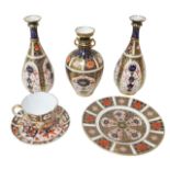 A group of Royal Crown Derby Imari pattern wares, including coffee can and saucer, a tea plate, a