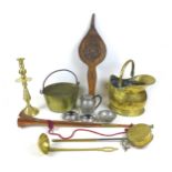 A group of copper and brass, including a pewter tea set, wooden bellows, a brass coaching horn,