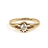 An 18ct gold diamond solitaire ring, the round cut stone approximately 2.5mm diameter, size L, 2.2g.