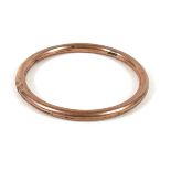 A 9ct rose gold bangle, a/f dented, S&P, Birmingham 1921, 7mm wide, 77mm internal, 90mm external,