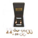 A collection of gold and yellow metal earrings, comprising a pair of diamond clip earrings, 1.6g,