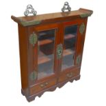 A small Korean display cabinet, with twin glazed doors and two internal shelves, 57 by 12.5 by