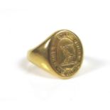 A yellow metal armorial signet ring, no hallmarks, size K, 7.8g, with original box.