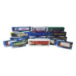 Sixteen die-cast model trucks by Cararama and Corgi, all with original boxes. (1 box)
