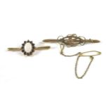 Two 9ct gold bar brooches, comprising a brooch with a swallow motif, 2g, 5.3cm wide, another