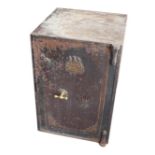 A cast iron safe by John & Jos. Taunton of Birmingham, with key, 51 by 55 by 75cm high.