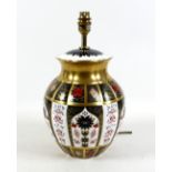 A Royal Crown Derby bone china table lamp, decorated in the ‘Old Imari’ pattern, 1128, 30cm high.
