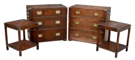 A Reprodux campaign style mahogany bedroom suite, comprising a pair of chests of three drawers,