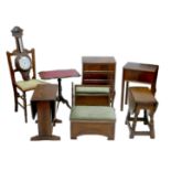 A group of vintage dark stained furniture, comprising two drop leaf occasional tables, a