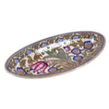 A Charlotte Read Bursley Ware oval dish, piped and painted decoration of pink and blue tulips,