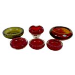 A group of six Whitefriars and Whitefriars style coloured glass bowls, in various designs, four