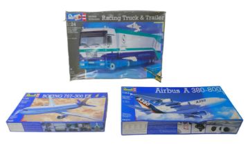 Three Revell model kits, including a 1:24 Racing truck and trailer kit, with original boxes. (3)