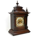 An Edwardian mahogany mantel clock, architectural case with finials, 33 by 19 by 53cm, chime on