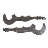 African tribal interest: two Bantu Ngulu swords, with large sickle blades and smaller hooks below,