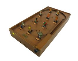 A vintage Chad Valley Tiger Tim's Weekly bagatelle wooden pinball game with seven spare ball