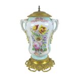 A 20th century ceramic and gilt metal lamp, hand painted with flowers, with moulded twin handles,