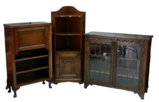 A group of furniture, comprising an Old Charm dark stained corner cabinet, with two open shelves and