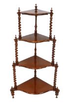 A Victorian rosewood four tier whatnot, a/f one foot detached from an old repair, 64 by 40 by