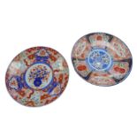 Two Japanese large Imari pattern chargers, 20th century, of different designs, one with a leaf