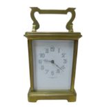 A small brass carriage clock by JAS Ritchie & Son of Edinburgh, with Arabic numeral dial, with