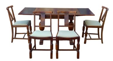 A 1950s oak draw leaf dining table, with baluster supports, 106 (166 extended) by 56 by 76cm high,