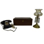 A trio of collectables comprising a black Bakelite rotary telephone, 24 by 18.5 by 13cm high, oil