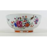 An 18th century Chinese porcelain bowl, enamelled floral decoration, a/f hairline to base and