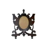 An ornate wooden picture frame, 79.5 by 67cm.